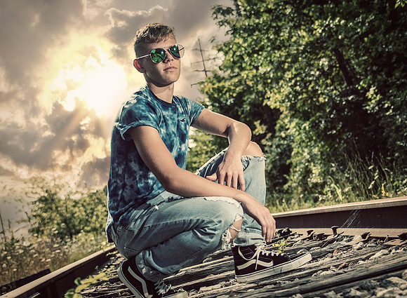 senior-boy-railroad tracks-modern