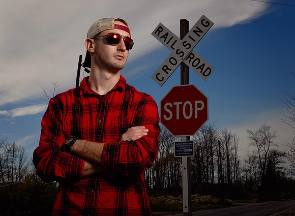 senior-pictures-boy-railroad tracks-edgy-creative